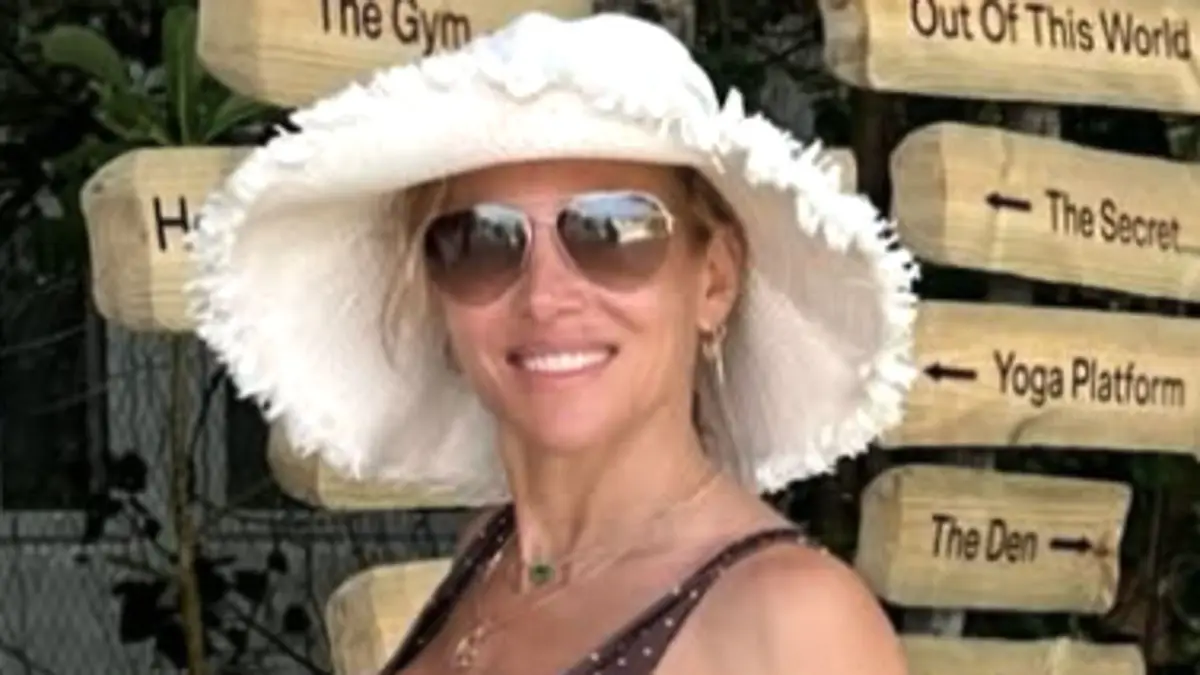 Elsa Pataky, 50, showcases washboard abs in polka-dot thong bikini on girls' getaway0