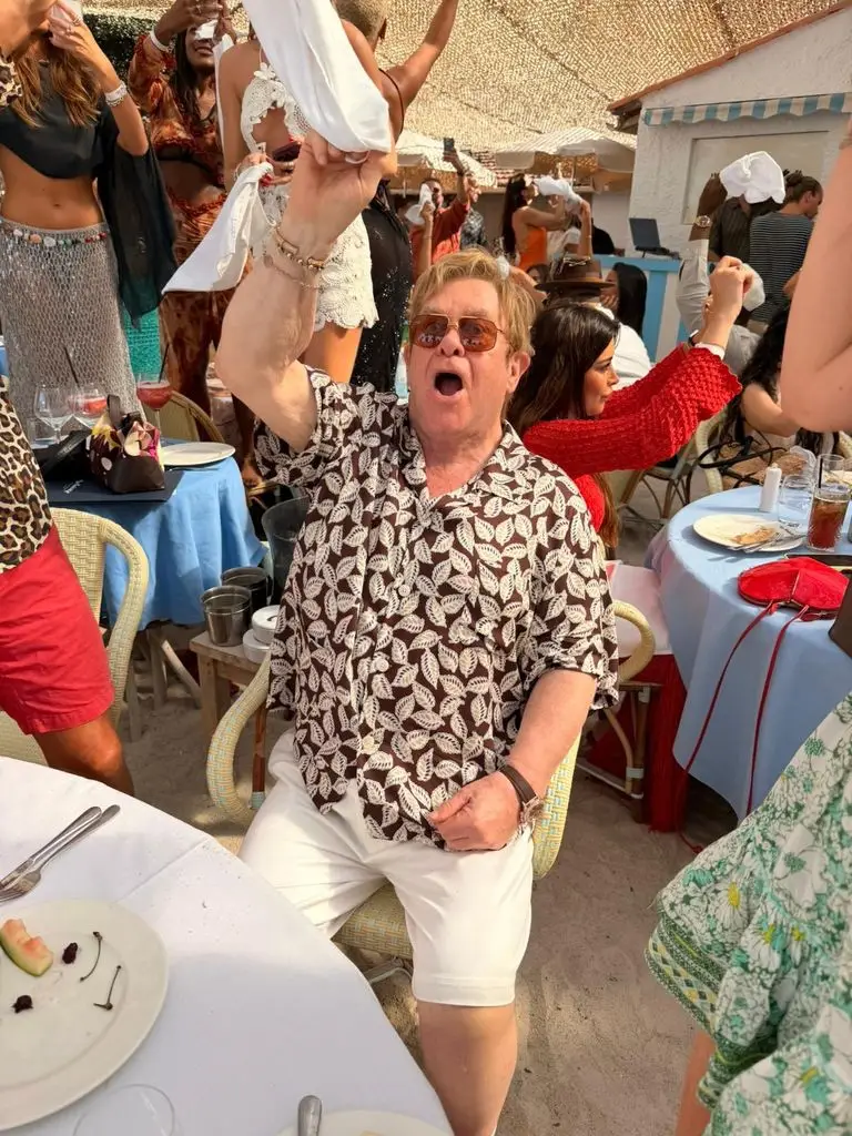 Elton John enjoys sun-soaked family holiday with rarely seen teenage sons4