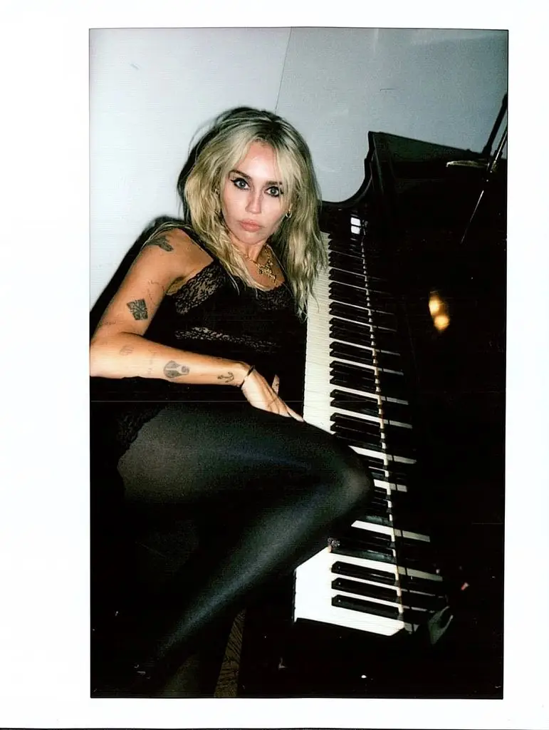 Miley Cyrus sizzles in daring lace dress at playful Chateau party4