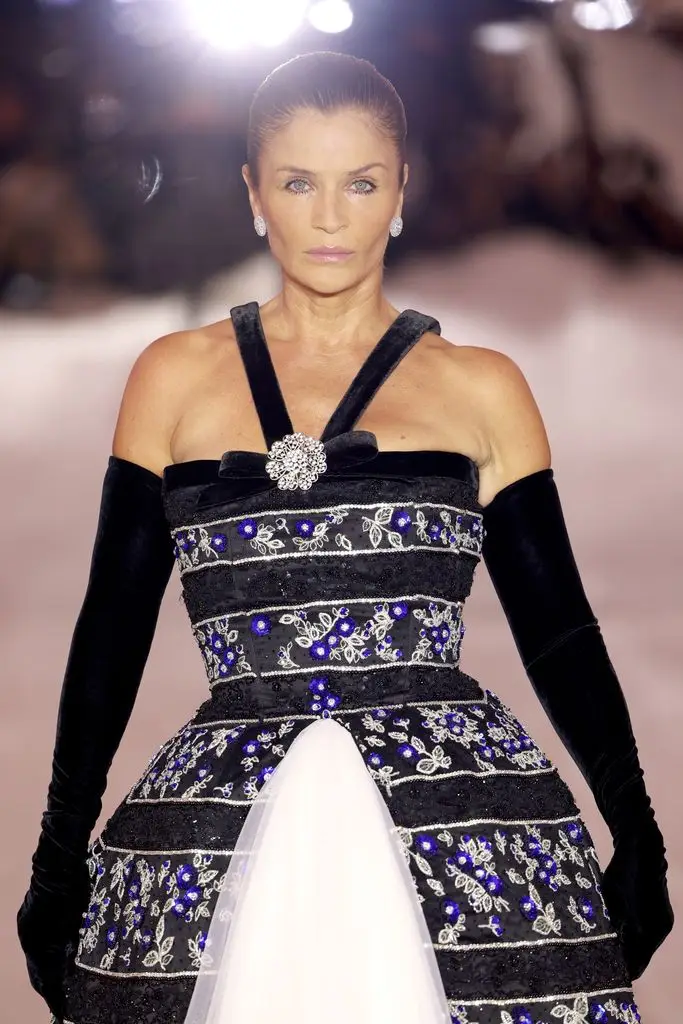 '90s supermodel Helena Christensen, 57, stuns in plunging lace 'naked' dress at London Fashion Week2