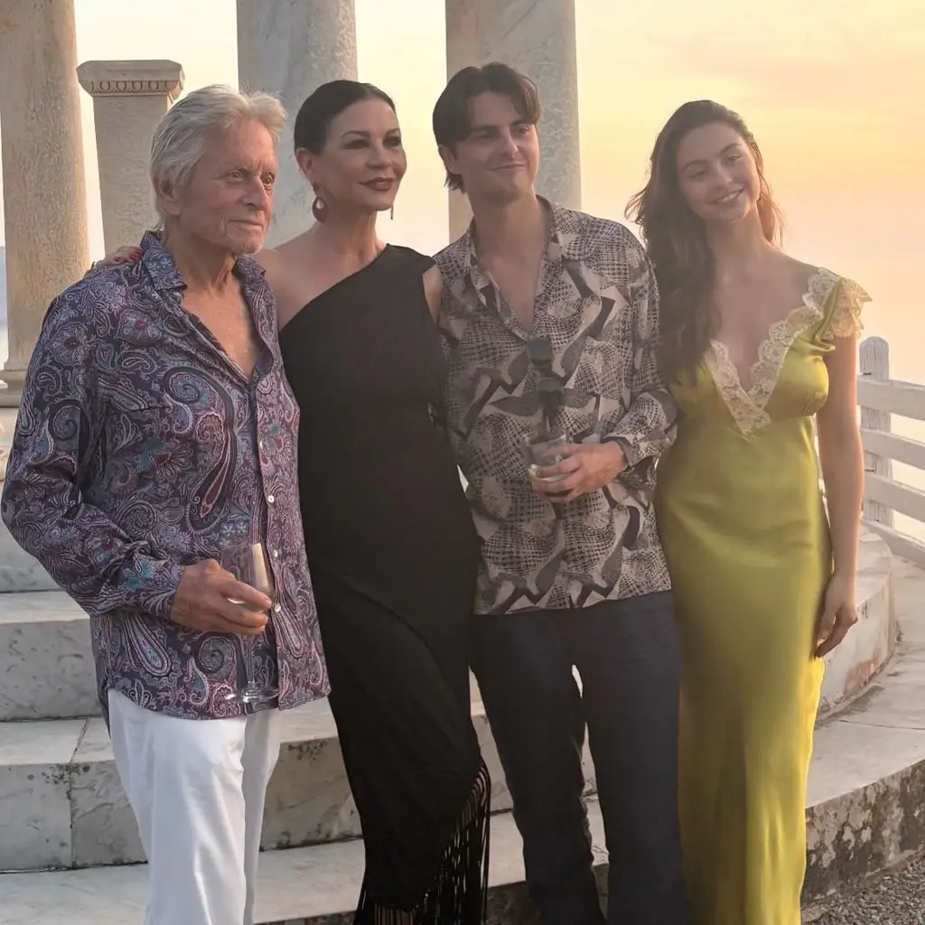 Bikini-clad Catherine Zeta-Jones kisses Michael Douglas in dreamy ocean photo to celebrate their joint birthdays4