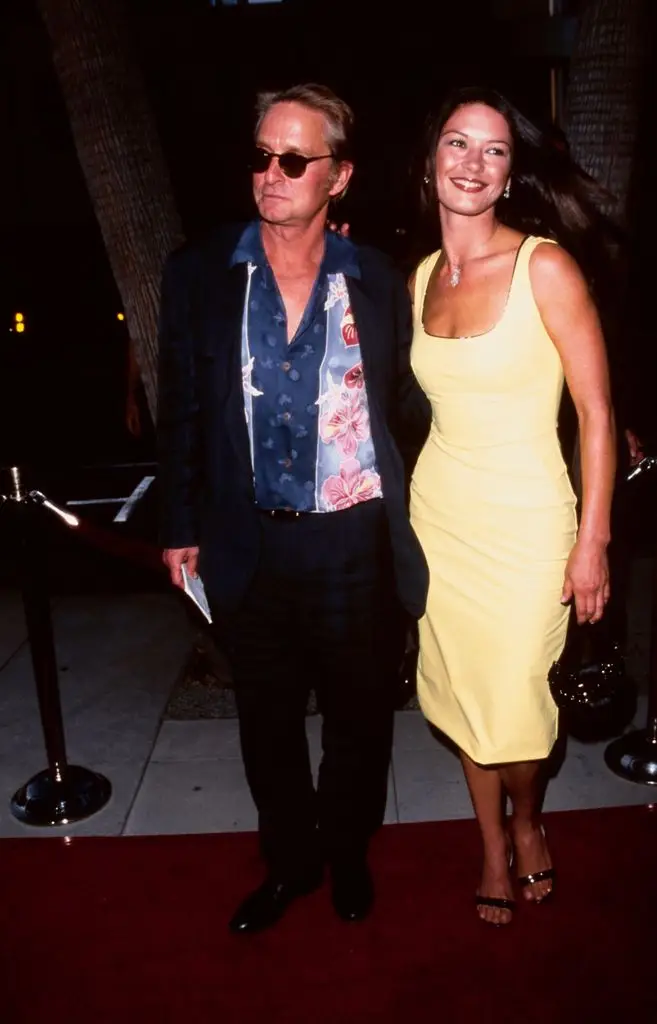 Bikini-clad Catherine Zeta-Jones kisses Michael Douglas in dreamy ocean photo to celebrate their joint birthdays2