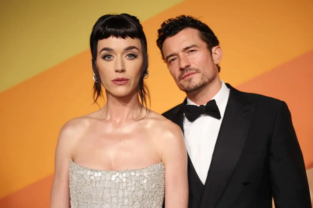 Shirtless Orlando Bloom looks ripped in James Bond-worthy beach appearance3
